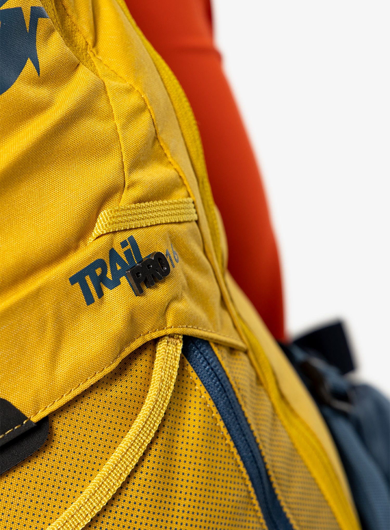 Ruksak MTB Evoc Trail Pro 16 - curry/denim