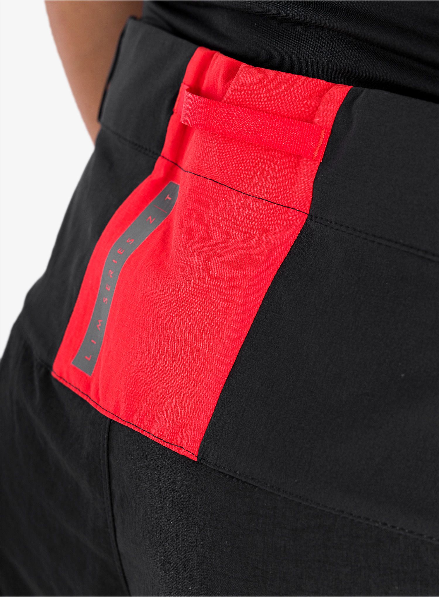 Muške trekking hlače Haglofs L.I.M ZT Pant - true black/zenith red