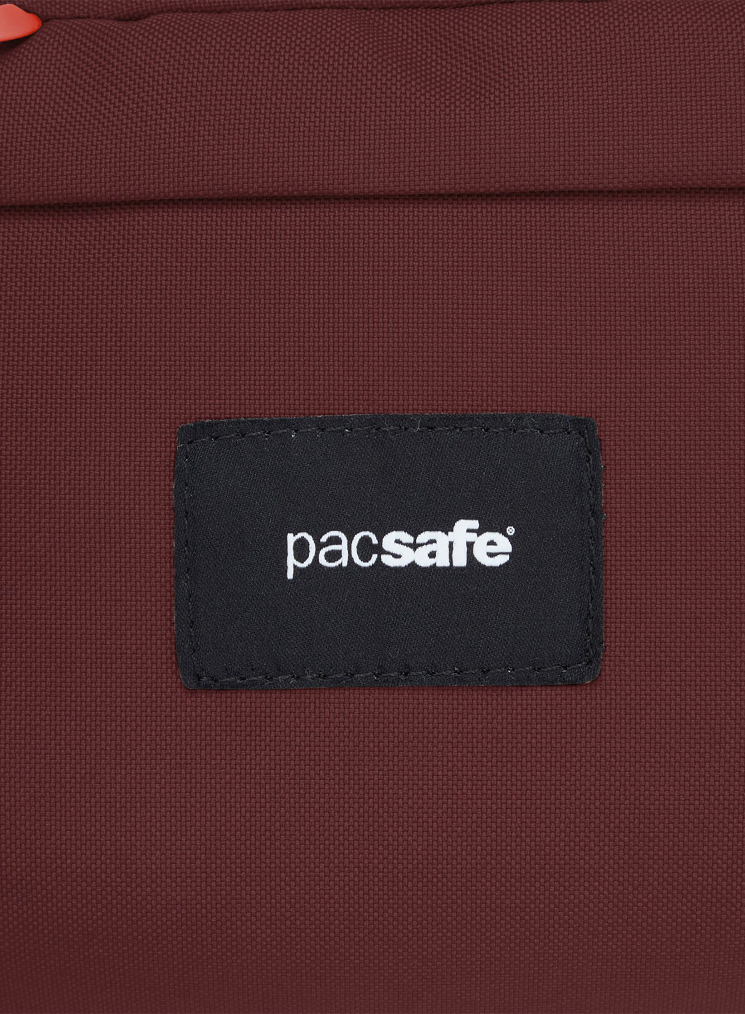 Torbica oko struka Pacsafe Go Sling Pack - garnet red