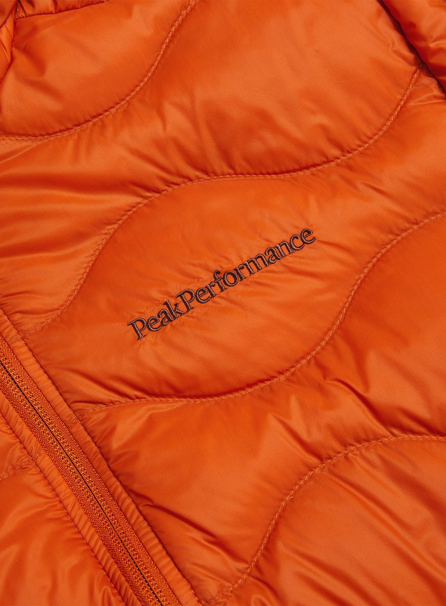 Pernata jakna Peak Performance Helium Down Hood Jacket - gold flame