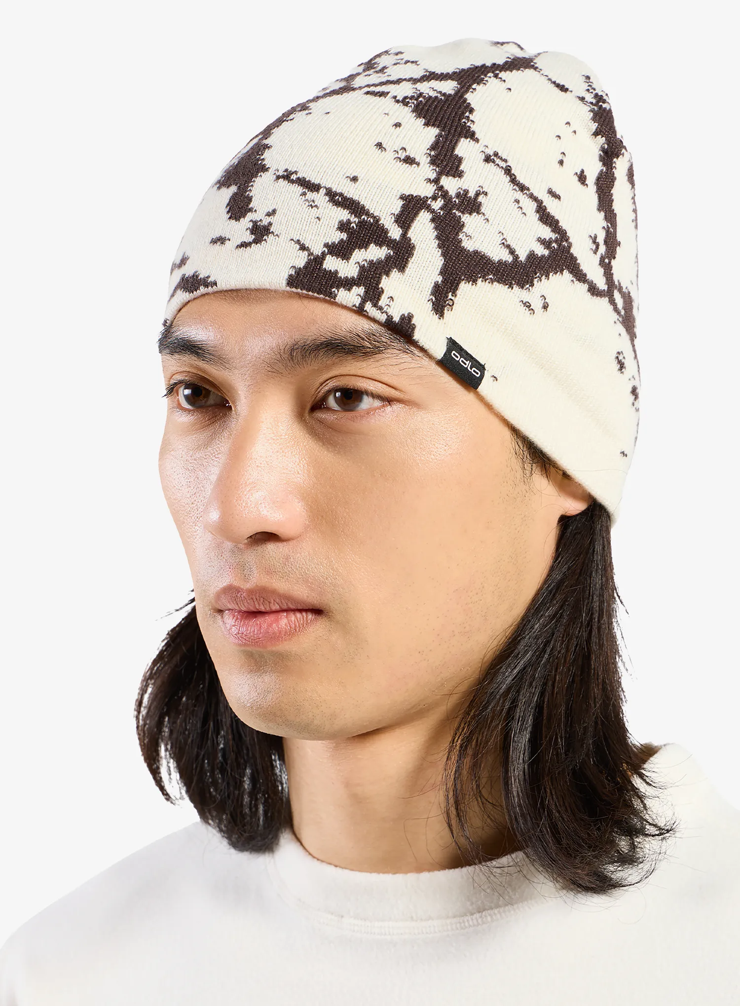 OdloEssentialReversibleHat_gardenia_fw26_7617977440390_097.webp